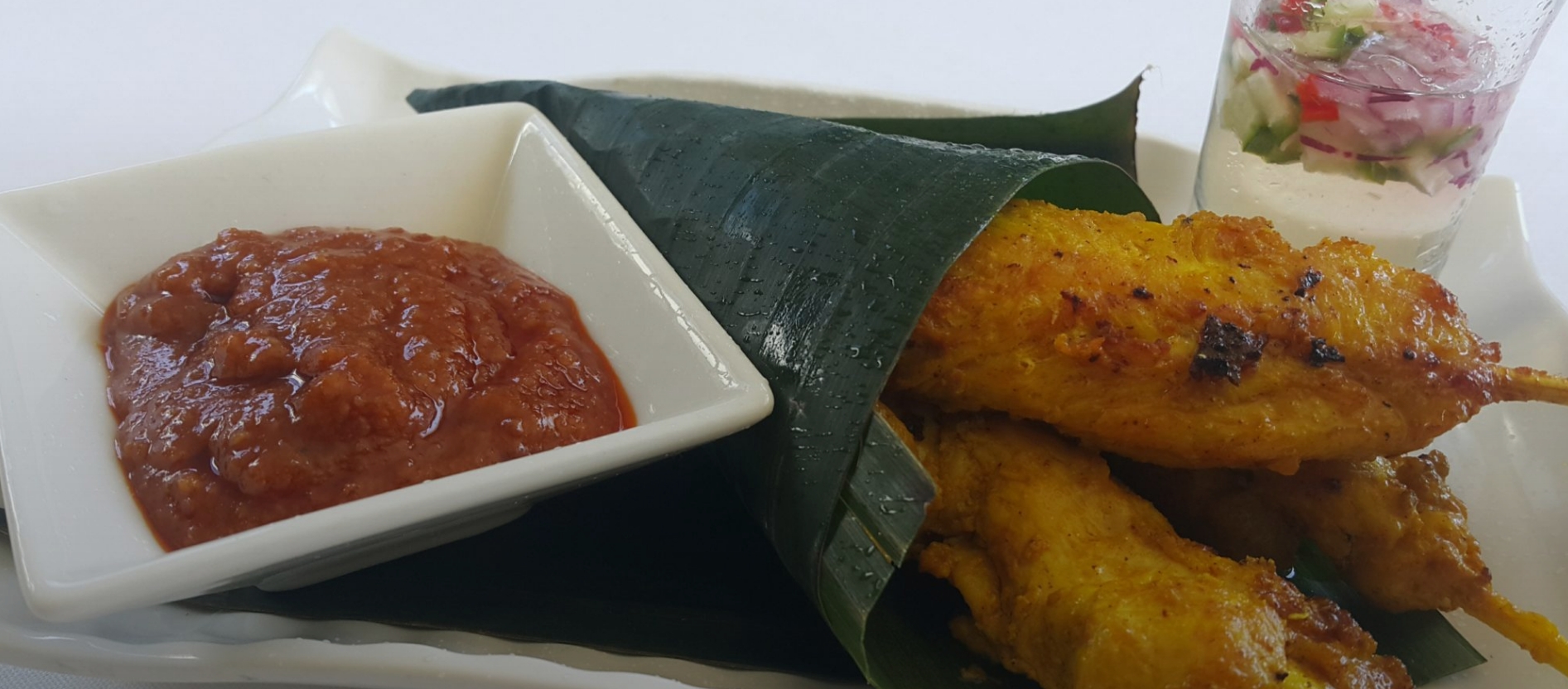 Chicken satay with peanut sauce at Ma Rew